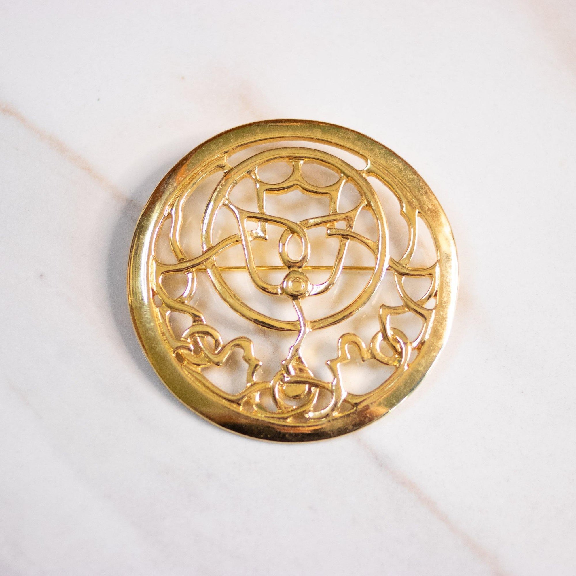 Vintage Mary McFadden Gold Medallion Brooch by Mary McFadden - Vintage Meet Modern Vintage Jewelry - Chicago, Illinois - #oldhollywoodglamour #vintagemeetmodern #designervintage #jewelrybox #antiquejewelry #vintagejewelry