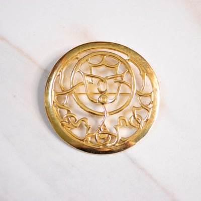 Vintage Mary McFadden Gold Medallion Brooch by Mary McFadden - Vintage Meet Modern Vintage Jewelry - Chicago, Illinois - #oldhollywoodglamour #vintagemeetmodern #designervintage #jewelrybox #antiquejewelry #vintagejewelry