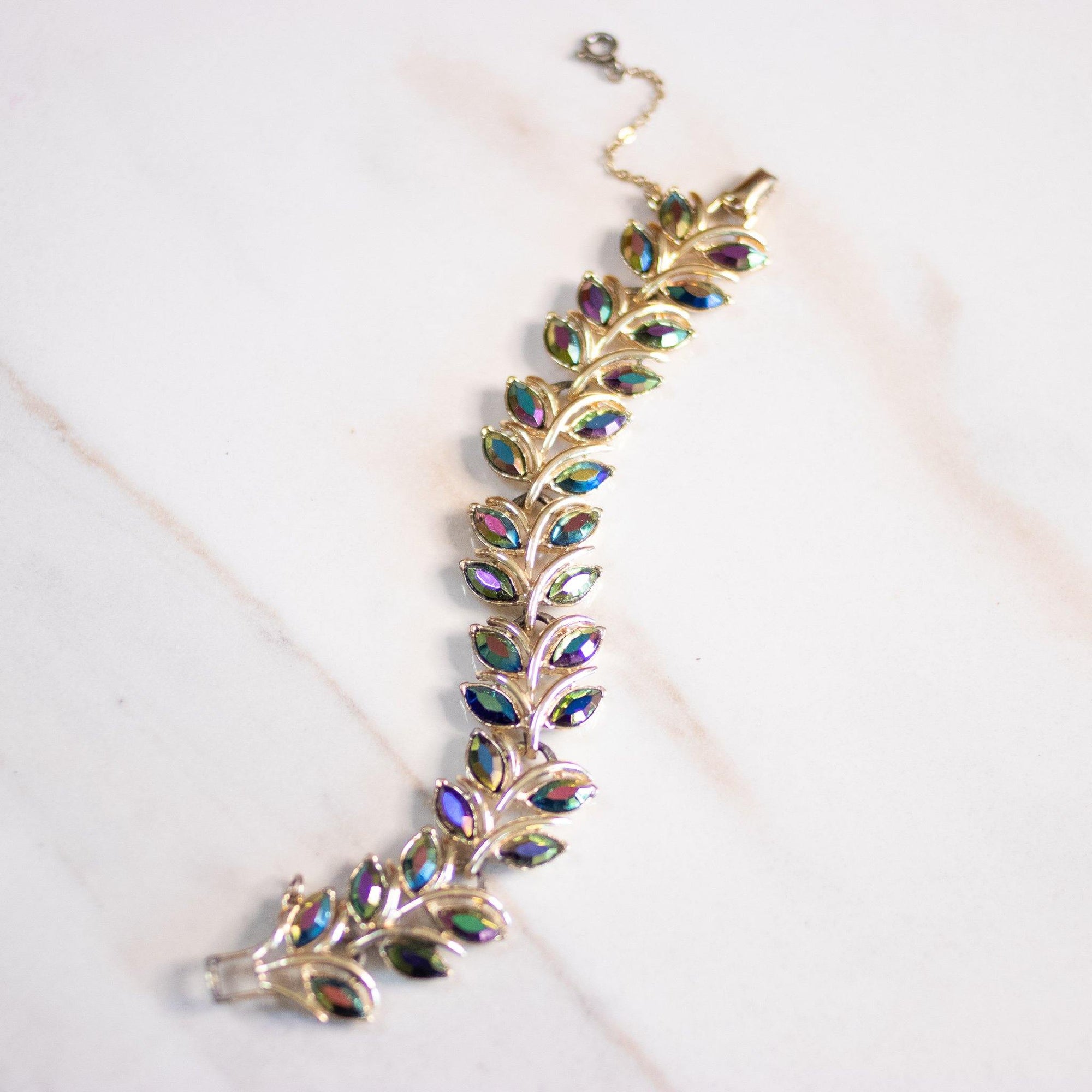 Vintage Coro Gold Leaf Bracelet with Rainbow Aurora Borealis Rhinestones by Coro - Vintage Meet Modern Vintage Jewelry - Chicago, Illinois - #oldhollywoodglamour #vintagemeetmodern #designervintage #jewelrybox #antiquejewelry #vintagejewelry