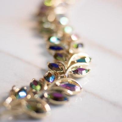 Vintage Coro Gold Leaf Bracelet with Rainbow Aurora Borealis Rhinestones by Coro - Vintage Meet Modern Vintage Jewelry - Chicago, Illinois - #oldhollywoodglamour #vintagemeetmodern #designervintage #jewelrybox #antiquejewelry #vintagejewelry