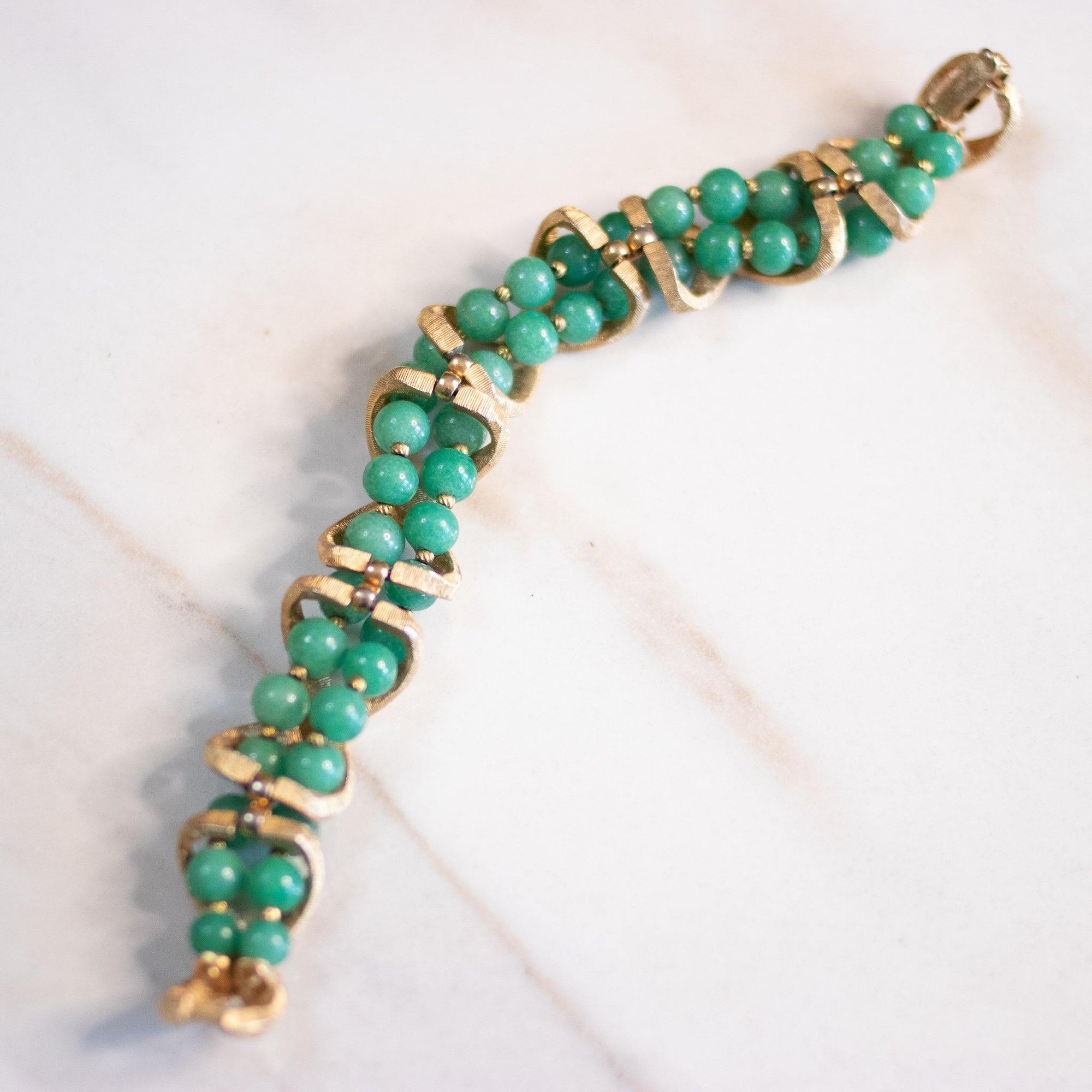Vintage Mid Century Modern Gold X Bracelet with Green Beads by Unsigned Beauty - Vintage Meet Modern Vintage Jewelry - Chicago, Illinois - #oldhollywoodglamour #vintagemeetmodern #designervintage #jewelrybox #antiquejewelry #vintagejewelry
