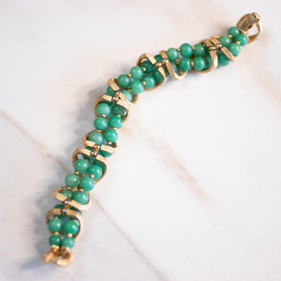 Vintage Mid Century Modern Gold X Bracelet with Green Beads by Unsigned Beauty - Vintage Meet Modern Vintage Jewelry - Chicago, Illinois - #oldhollywoodglamour #vintagemeetmodern #designervintage #jewelrybox #antiquejewelry #vintagejewelry