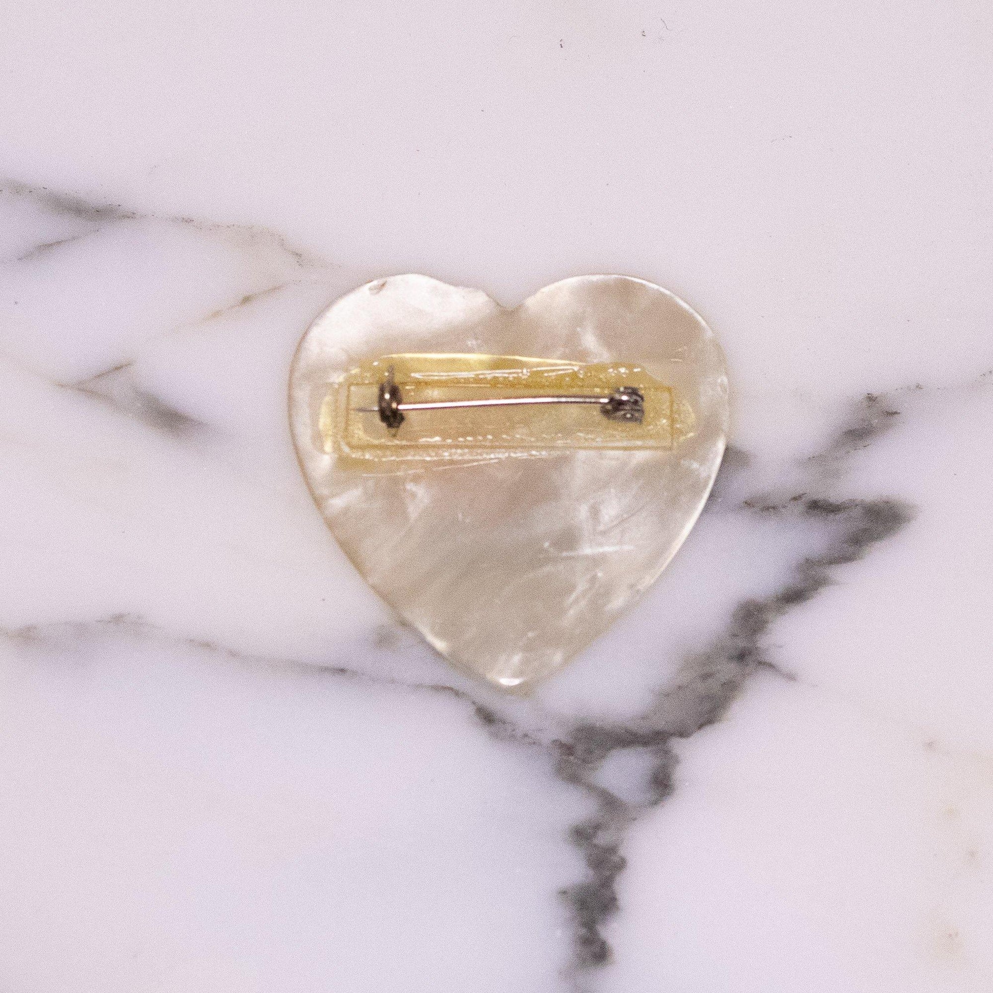 Vintage Heart Shaped White Moonglow Lucite Plastic with Floral Design Vintage Brooch by Mid Century Modern - Vintage Meet Modern Vintage Jewelry - Chicago, Illinois - #oldhollywoodglamour #vintagemeetmodern #designervintage #jewelrybox #antiquejewelry #vintagejewelry
