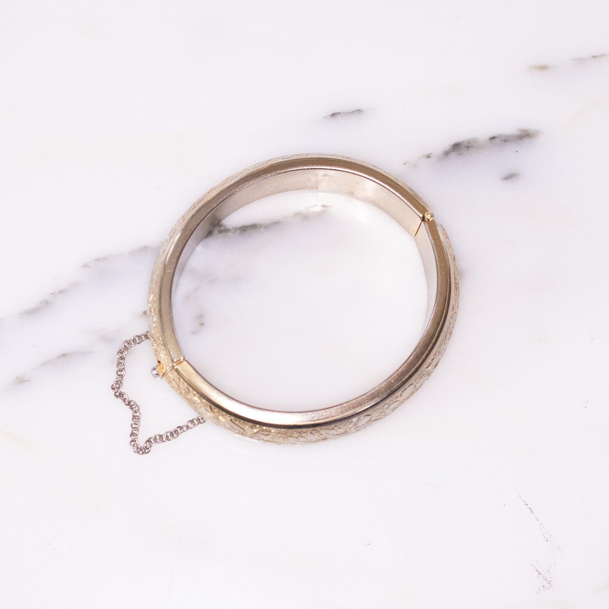 Vintage 1950s Gold Floral Embossed Bangle Bracelet by 1950s - Vintage Meet Modern Vintage Jewelry - Chicago, Illinois - #oldhollywoodglamour #vintagemeetmodern #designervintage #jewelrybox #antiquejewelry #vintagejewelry