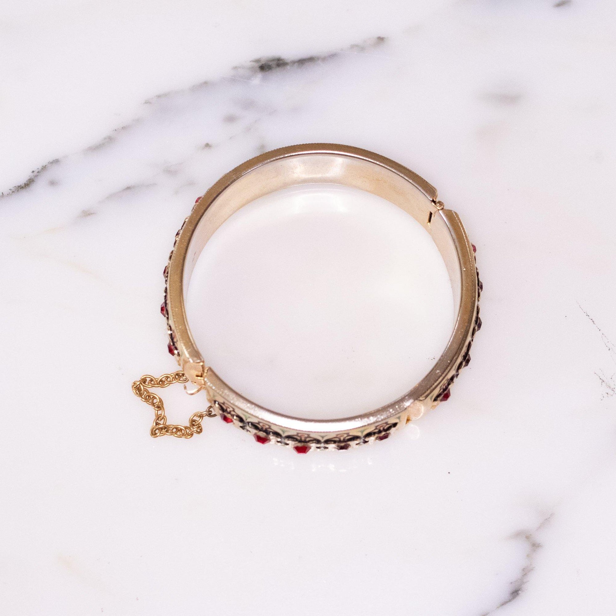 Vintage Gold Hinged Bangle Bracelet with Black and Green Enamel and Red Rhinestones by Czech - Vintage Meet Modern Vintage Jewelry - Chicago, Illinois - #oldhollywoodglamour #vintagemeetmodern #designervintage #jewelrybox #antiquejewelry #vintagejewelry