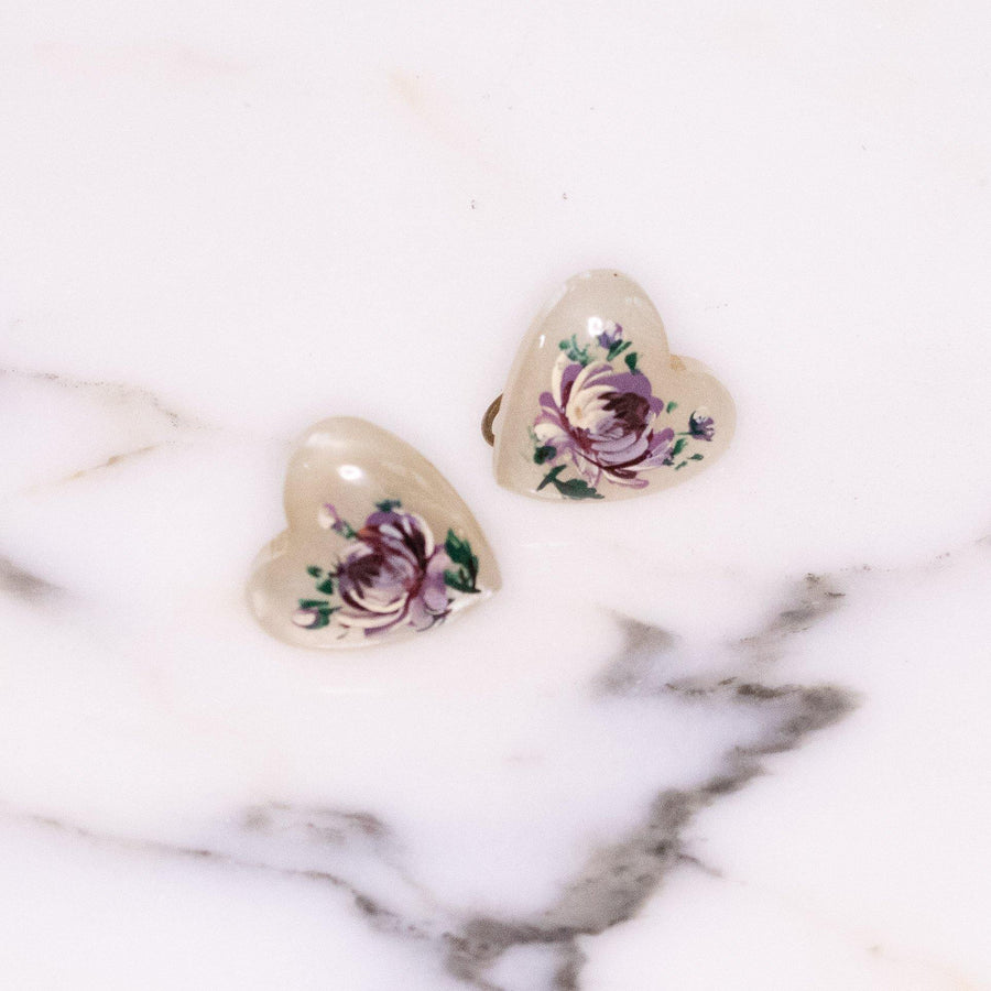Vintage Heart Shaped White Moonglow Lucite Plastic with Floral Design Earrings by Unsigned - Vintage Meet Modern Vintage Jewelry - Chicago, Illinois - #oldhollywoodglamour #vintagemeetmodern #designervintage #jewelrybox #antiquejewelry #vintagejewelry
