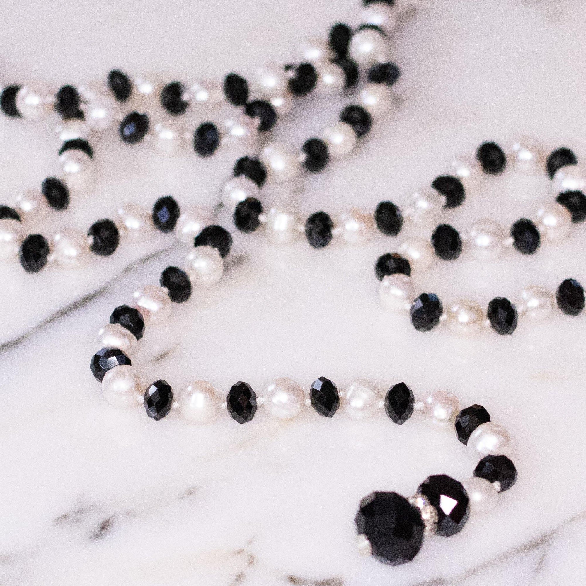 Vintage Jet Crystal and Freshwater Pearl Lariat by Unsigned Beauty - Vintage Meet Modern Vintage Jewelry - Chicago, Illinois - #oldhollywoodglamour #vintagemeetmodern #designervintage #jewelrybox #antiquejewelry #vintagejewelry