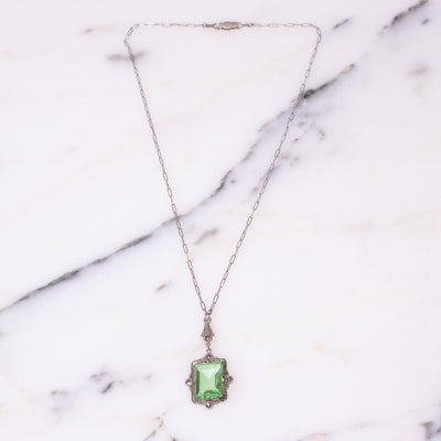 Vintage Art Deco Era Light Green Crystal Sterling Silver Filigree Pendant Necklace with Marcasite Detail by Signed Sterling - Vintage Meet Modern Vintage Jewelry - Chicago, Illinois - #oldhollywoodglamour #vintagemeetmodern #designervintage #jewelrybox #antiquejewelry #vintagejewelry