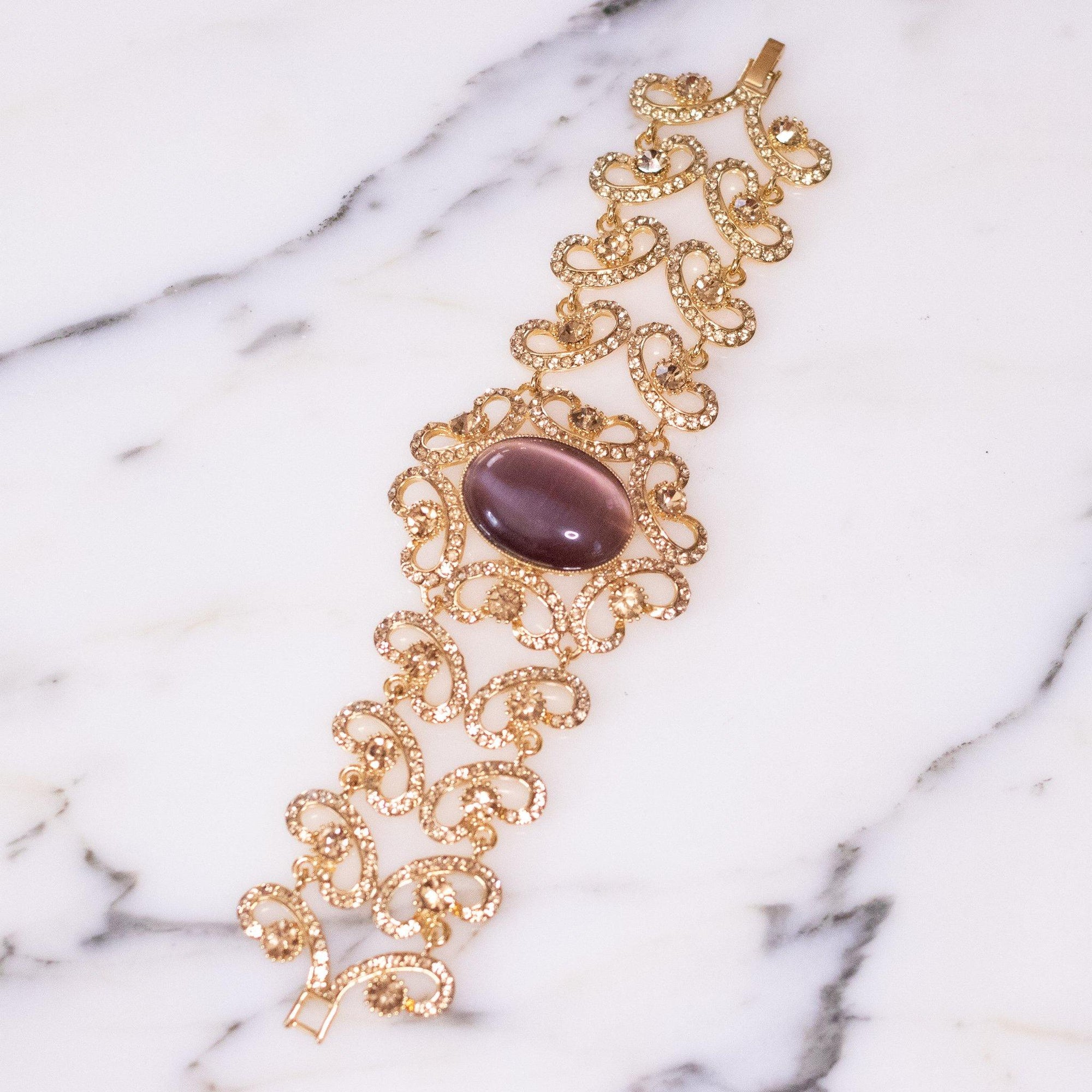 Vintage Gold Filigree Scroll Link Bracelet with Amethyst Cats Eye Moonglow Cabochon by Filigree - Vintage Meet Modern Vintage Jewelry - Chicago, Illinois - #oldhollywoodglamour #vintagemeetmodern #designervintage #jewelrybox #antiquejewelry #vintagejewelry