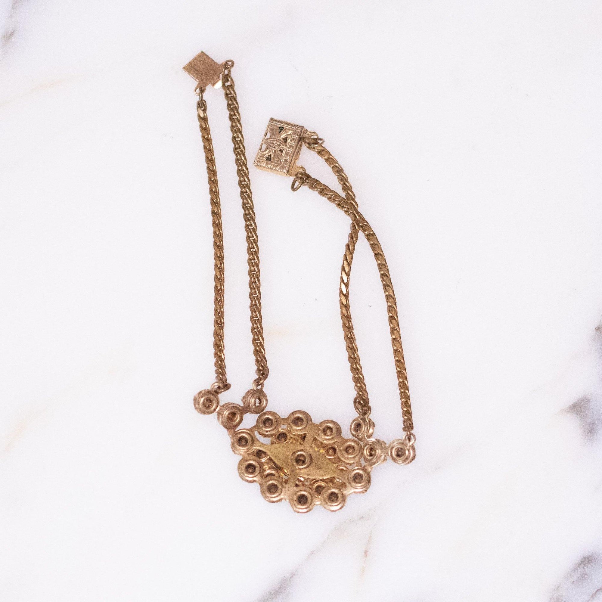 Vintage 1940s Gilt Bracelet with Diamante and Emerald Green Crystals by Unsigned Beauty - Vintage Meet Modern Vintage Jewelry - Chicago, Illinois - #oldhollywoodglamour #vintagemeetmodern #designervintage #jewelrybox #antiquejewelry #vintagejewelry