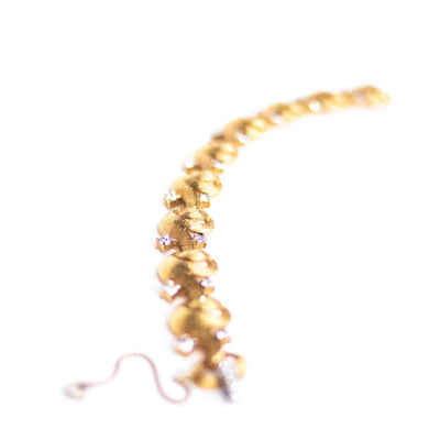 Vintage Mid Century Modern Era Gold Scroll Link Bracelet with Diamante Rhinestones by Unsigned Beauty - Vintage Meet Modern Vintage Jewelry - Chicago, Illinois - #oldhollywoodglamour #vintagemeetmodern #designervintage #jewelrybox #antiquejewelry #vintagejewelry