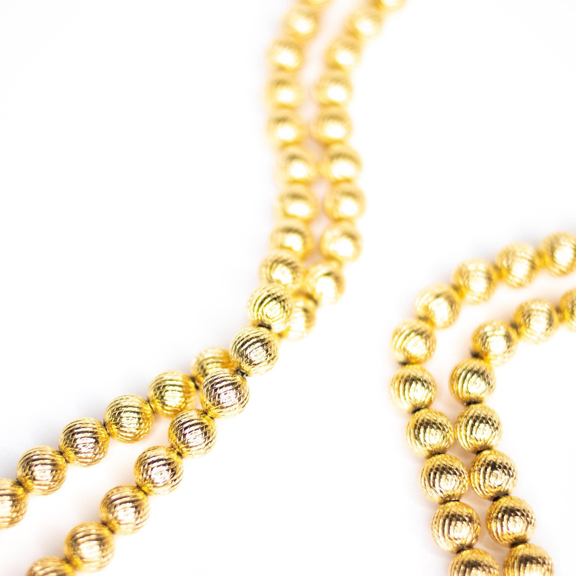 Vintage Double-Strand Gold Bead Necklace by Unsigned Beauty - Vintage Meet Modern Vintage Jewelry - Chicago, Illinois - #oldhollywoodglamour #vintagemeetmodern #designervintage #jewelrybox #antiquejewelry #vintagejewelry
