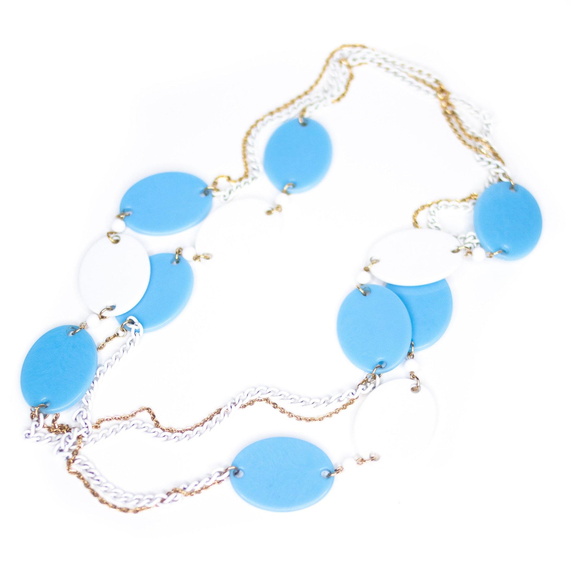Vintage 1960s Mod Style Oversized Blue and White Disc Necklace by Vintage Meet Modern - Vintage Meet Modern Vintage Jewelry - Chicago, Illinois - #oldhollywoodglamour #vintagemeetmodern #designervintage #jewelrybox #antiquejewelry #vintagejewelry