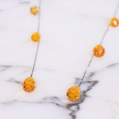 Vintage Art Deco Faceted Amber Glass Delicate Lariat Necklace by Vintage Meet Modern - Vintage Meet Modern Vintage Jewelry - Chicago, Illinois - #oldhollywoodglamour #vintagemeetmodern #designervintage #jewelrybox #antiquejewelry #vintagejewelry