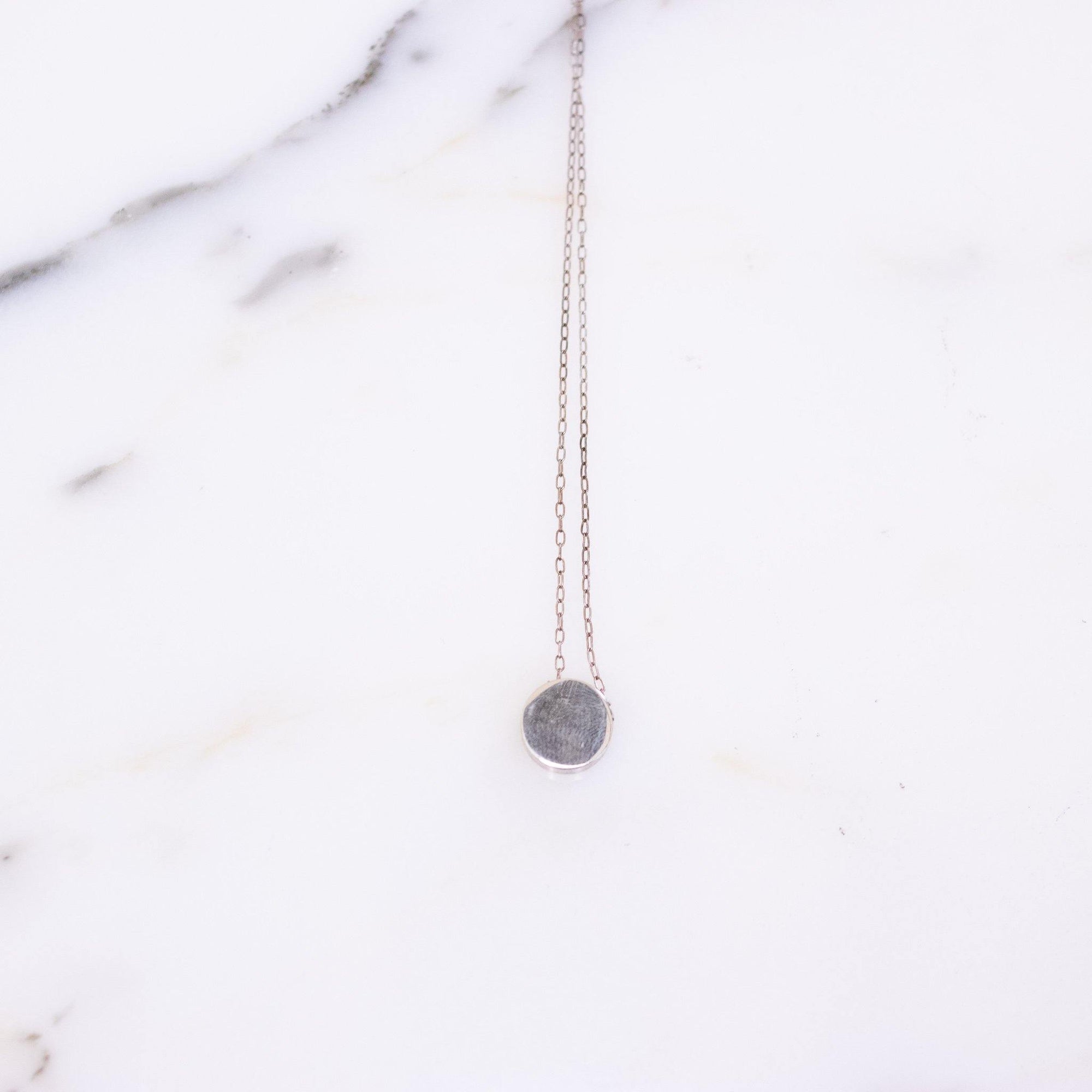 Vintage 1970s Silver Floating Medallion Pendant Necklace by Hallmarked Sterling Silver Chain - Vintage Meet Modern Vintage Jewelry - Chicago, Illinois - #oldhollywoodglamour #vintagemeetmodern #designervintage #jewelrybox #antiquejewelry #vintagejewelry