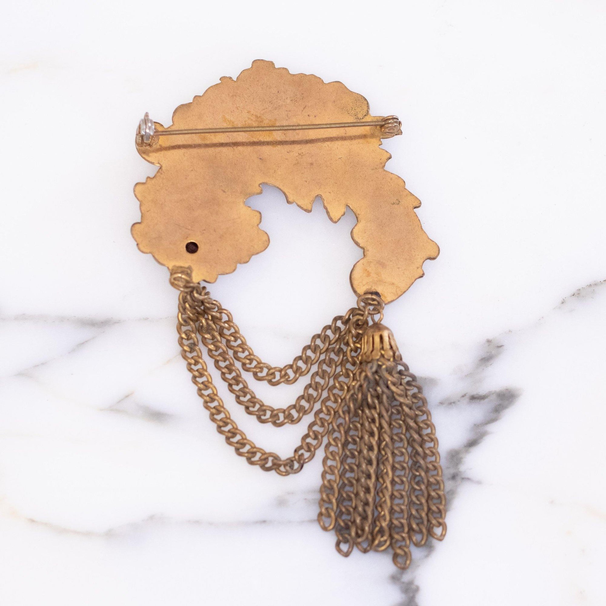 Art Nouveau Gilt Swag Brooch Embossed Design with Gold Tassel by Unsigned - Vintage Meet Modern Vintage Jewelry - Chicago, Illinois - #oldhollywoodglamour #vintagemeetmodern #designervintage #jewelrybox #antiquejewelry #vintagejewelry