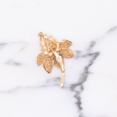 Vintage Crown Trifari Flower Brooch with Faux Pearls by Vintage Meet Modern - Vintage Meet Modern Vintage Jewelry - Chicago, Illinois - #oldhollywoodglamour #vintagemeetmodern #designervintage #jewelrybox #antiquejewelry #vintagejewelry