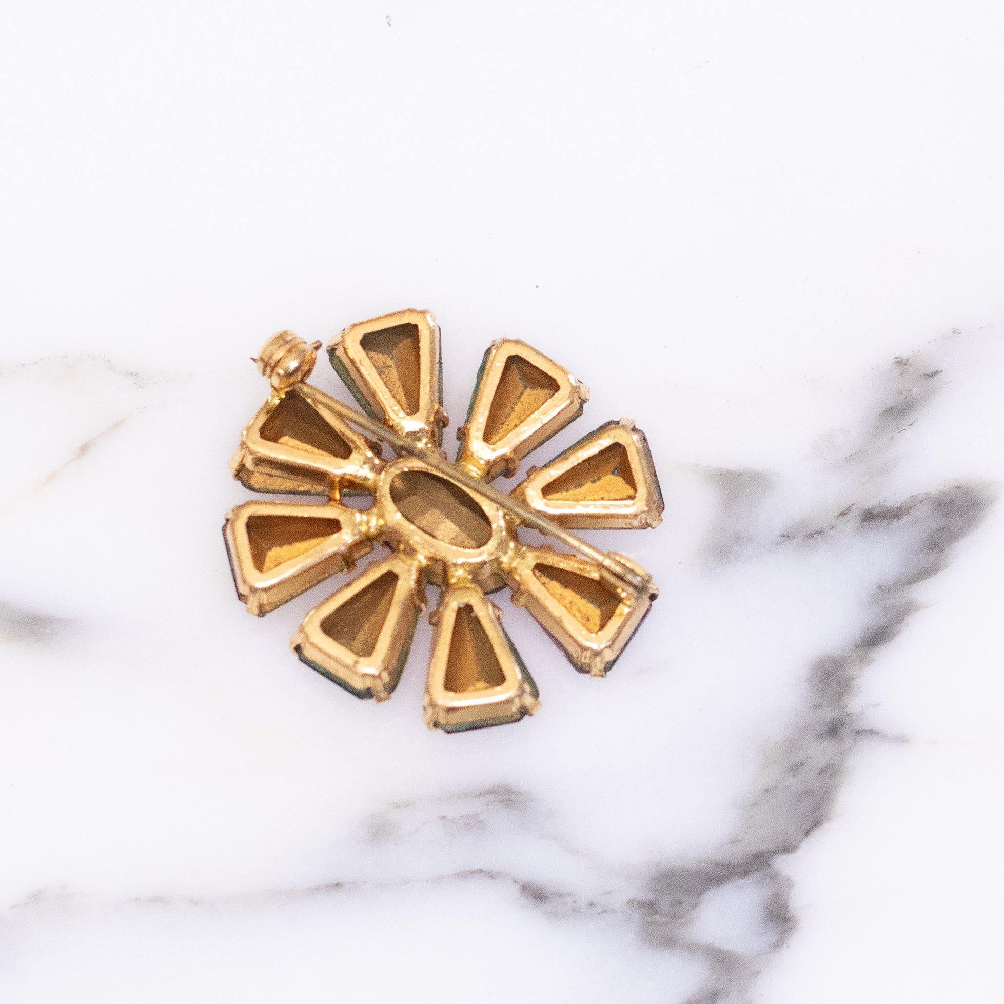 Vintage Purple Crystal Pinwheel Brooch by Vintage Meet Modern - Vintage Meet Modern Vintage Jewelry - Chicago, Illinois - #oldhollywoodglamour #vintagemeetmodern #designervintage #jewelrybox #antiquejewelry #vintagejewelry