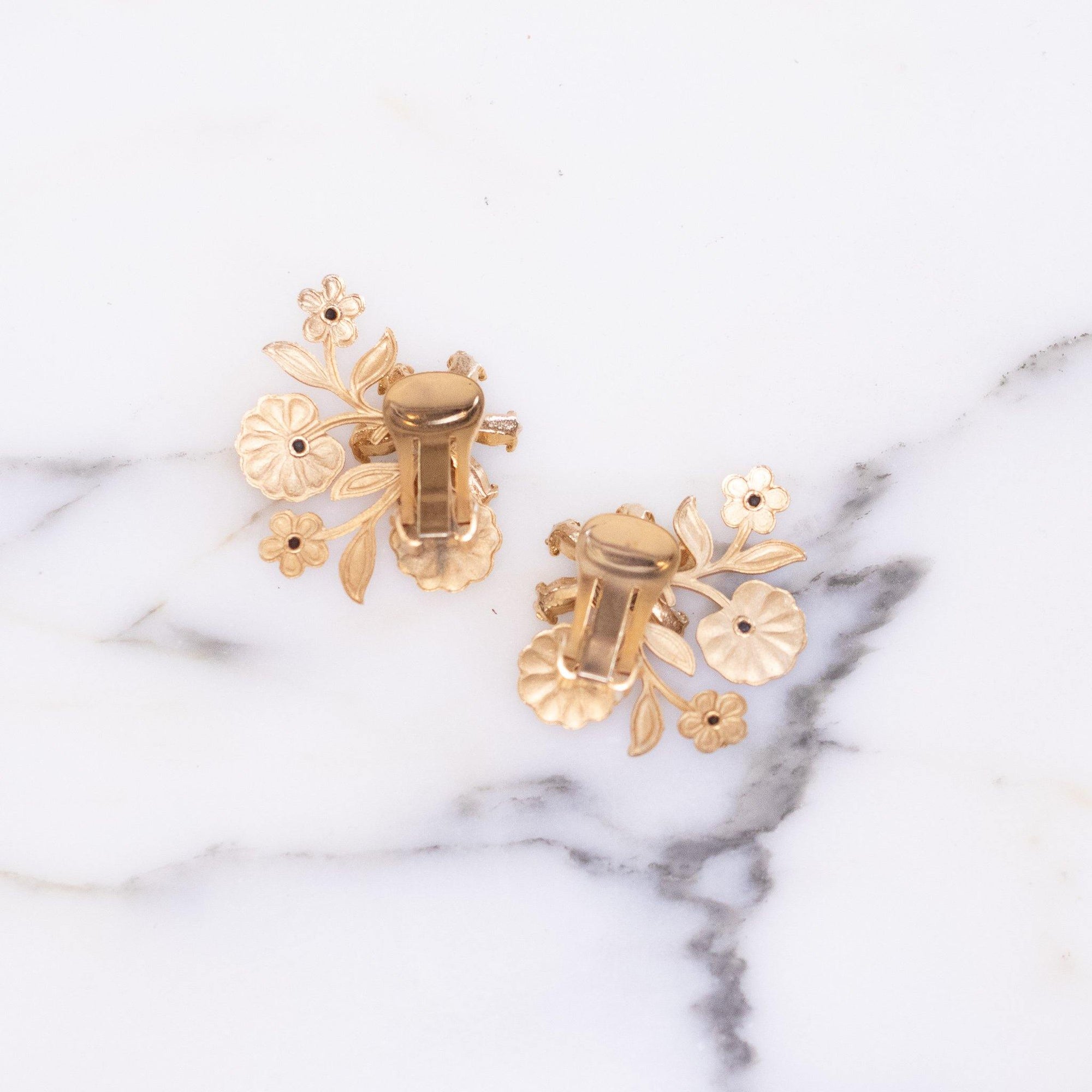 Vintage Mid Century Modern Gold Flower Earrings with Blue and Aurora Borealis Rhinestones by Unsigned - Vintage Meet Modern Vintage Jewelry - Chicago, Illinois - #oldhollywoodglamour #vintagemeetmodern #designervintage #jewelrybox #antiquejewelry #vintagejewelry