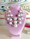 Vintage Pearl White Lucite Triple Strand Necklace by Vintage Meet Modern - Vintage Meet Modern Vintage Jewelry - Chicago, Illinois - #oldhollywoodglamour #vintagemeetmodern #designervintage #jewelrybox #antiquejewelry #vintagejewelry