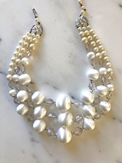 Vintage Pearl White Lucite Triple Strand Necklace by Vintage Meet Modern - Vintage Meet Modern Vintage Jewelry - Chicago, Illinois - #oldhollywoodglamour #vintagemeetmodern #designervintage #jewelrybox #antiquejewelry #vintagejewelry
