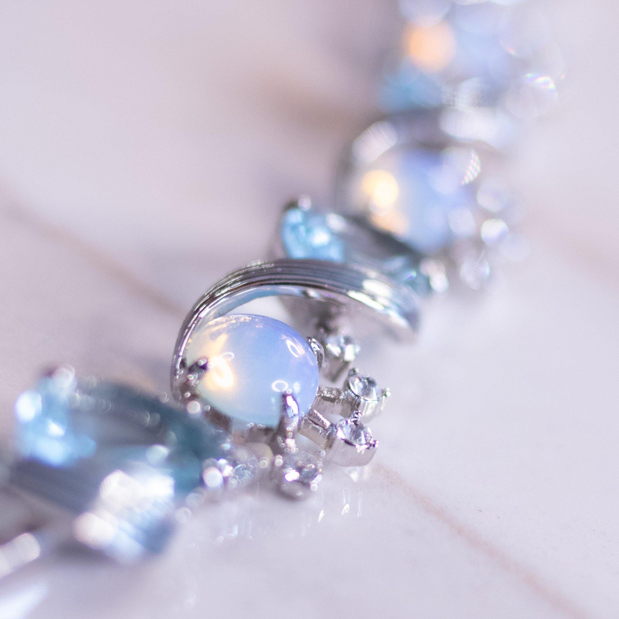 Vintage Camrose and Kross JBK Moonstone Glass and Blue Crystal Bracelet by Camrose and Kross - Vintage Meet Modern Vintage Jewelry - Chicago, Illinois - #oldhollywoodglamour #vintagemeetmodern #designervintage #jewelrybox #antiquejewelry #vintagejewelry