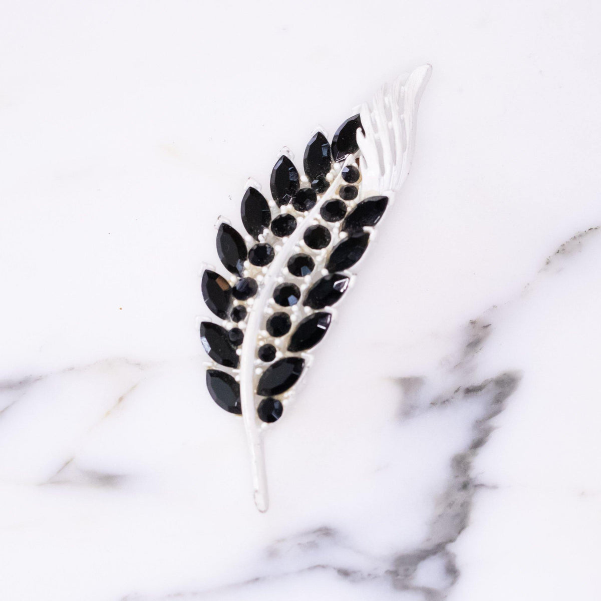 Vintage White Enamel Brooch with Jet Black Crystal Leaves