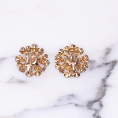 Vintage Shade of Green Starburst Pinwheel Rhinestone Earrings by Vintage Meet Modern  - Vintage Meet Modern Vintage Jewelry - Chicago, Illinois - #oldhollywoodglamour #vintagemeetmodern #designervintage #jewelrybox #antiquejewelry #vintagejewelry