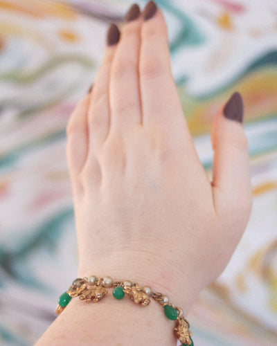 Vintage Faux Pearl with Gold Walking Elephant and Jade Glass Bead Charm Bracelet by Vintage Meet Modern - Vintage Meet Modern Vintage Jewelry - Chicago, Illinois - #oldhollywoodglamour #vintagemeetmodern #designervintage #jewelrybox #antiquejewelry #vintagejewelry