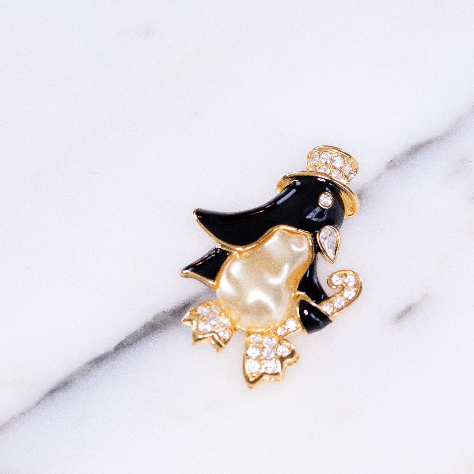 Vintage Kenneth Jay Lane Dancing Penguin Brooch by Vintage Meet Modern - Vintage Meet Modern Vintage Jewelry - Chicago, Illinois - #oldhollywoodglamour #vintagemeetmodern #designervintage #jewelrybox #antiquejewelry #vintagejewelry