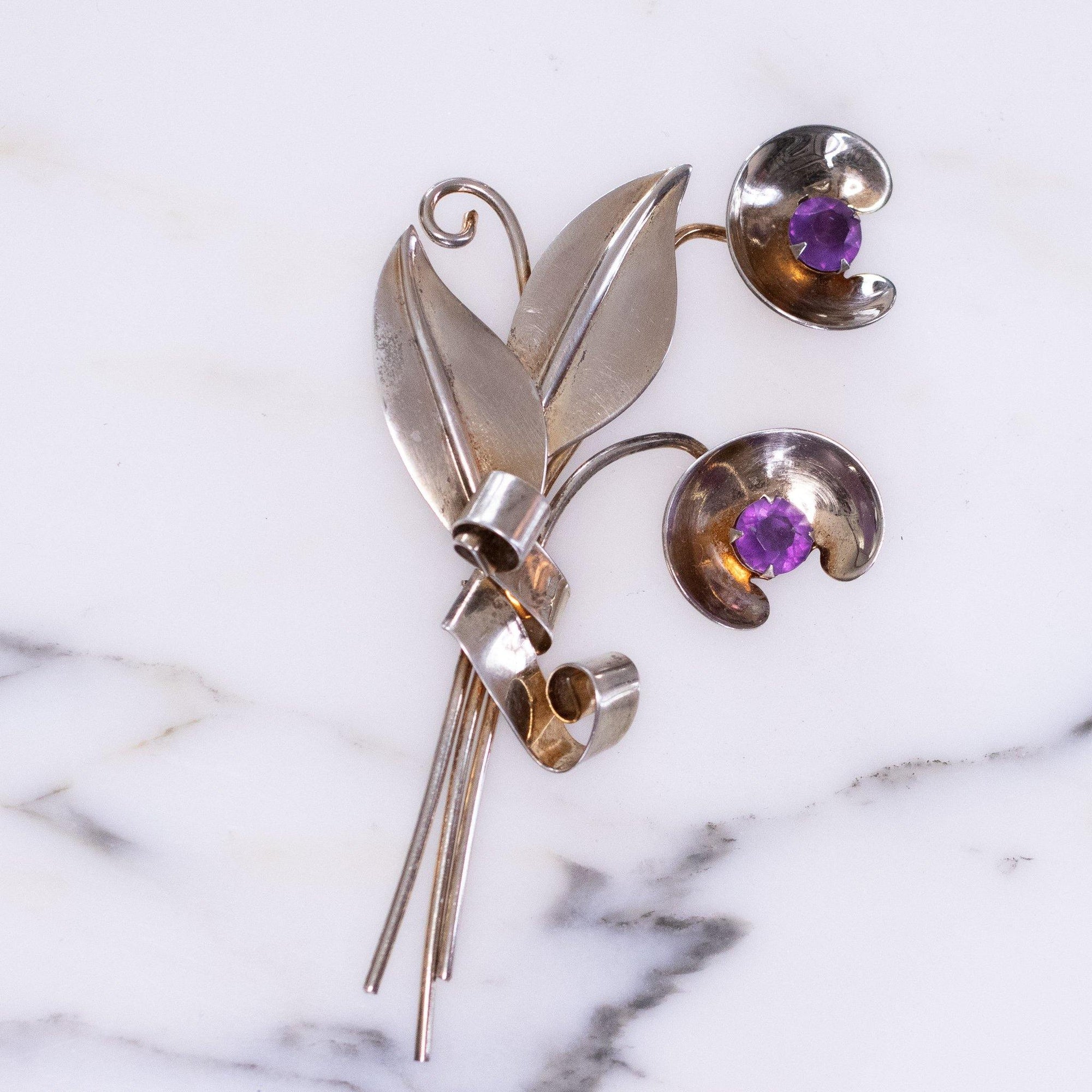 Vintage 1940s Sterling Silver Floral Spray Brooch with Amethyst Crystal Centers by Vintage Meet Modern - Vintage Meet Modern Vintage Jewelry - Chicago, Illinois - #oldhollywoodglamour #vintagemeetmodern #designervintage #jewelrybox #antiquejewelry #vintagejewelry