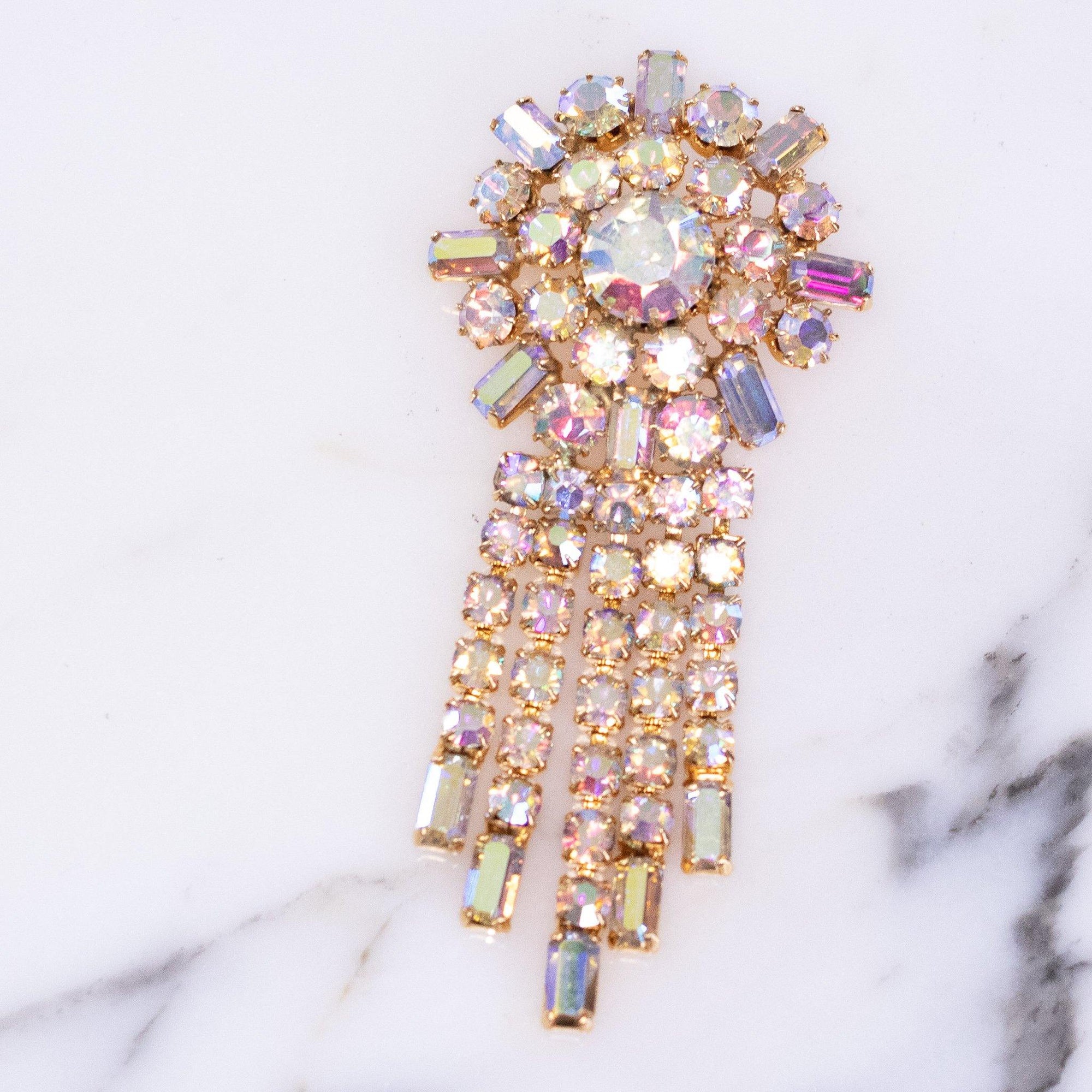 Vintage 1950s Sparkling Aurora Borealis Brooch with Rhinestone Tassels by Vintage Meet Modern - Vintage Meet Modern Vintage Jewelry - Chicago, Illinois - #oldhollywoodglamour #vintagemeetmodern #designervintage #jewelrybox #antiquejewelry #vintagejewelry