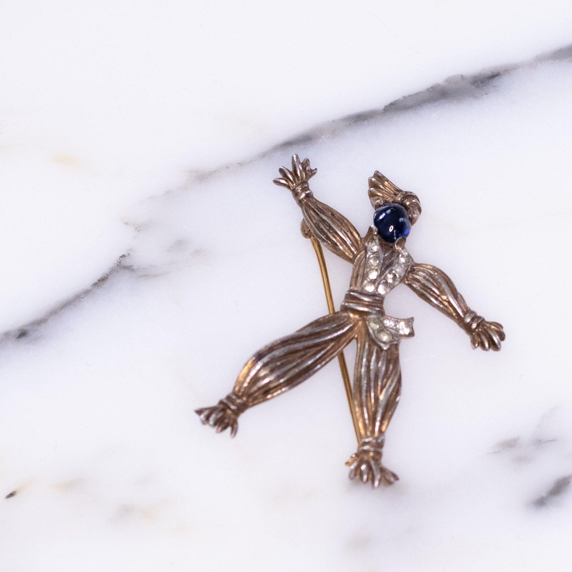 Vintage Crown Trifari Sterling Silver Rag Doll with Sapphire Blue Cabochon Face and Diamante Crystal Accents by Vintage Meet Modern - Vintage Meet Modern Vintage Jewelry - Chicago, Illinois - #oldhollywoodglamour #vintagemeetmodern #designervintage #jewelrybox #antiquejewelry #vintagejewelry