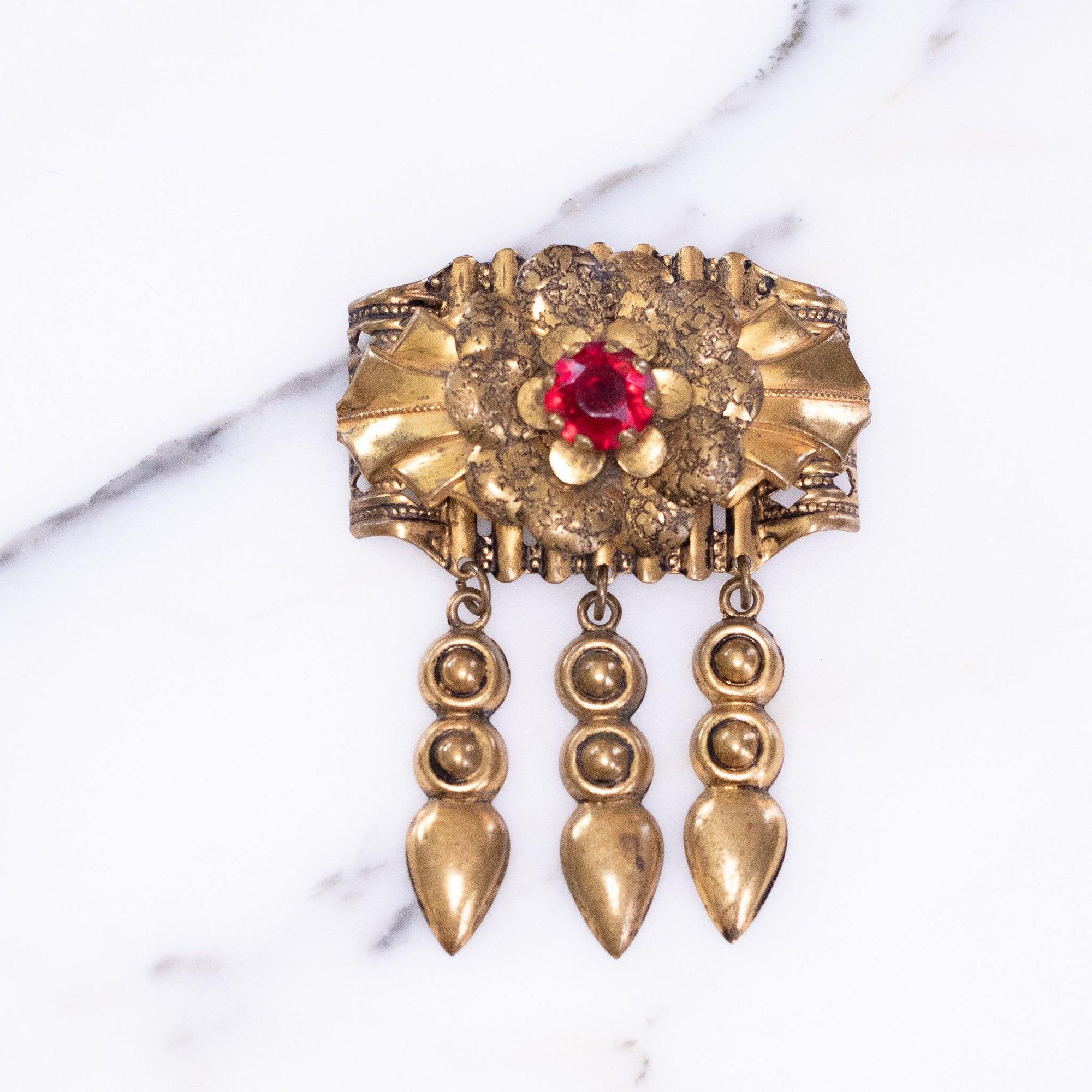 Vintage 1940s Gilt Brooch with Dangles and Red Rhinestone by Vintage Meet Modern - Vintage Meet Modern Vintage Jewelry - Chicago, Illinois - #oldhollywoodglamour #vintagemeetmodern #designervintage #jewelrybox #antiquejewelry #vintagejewelry
