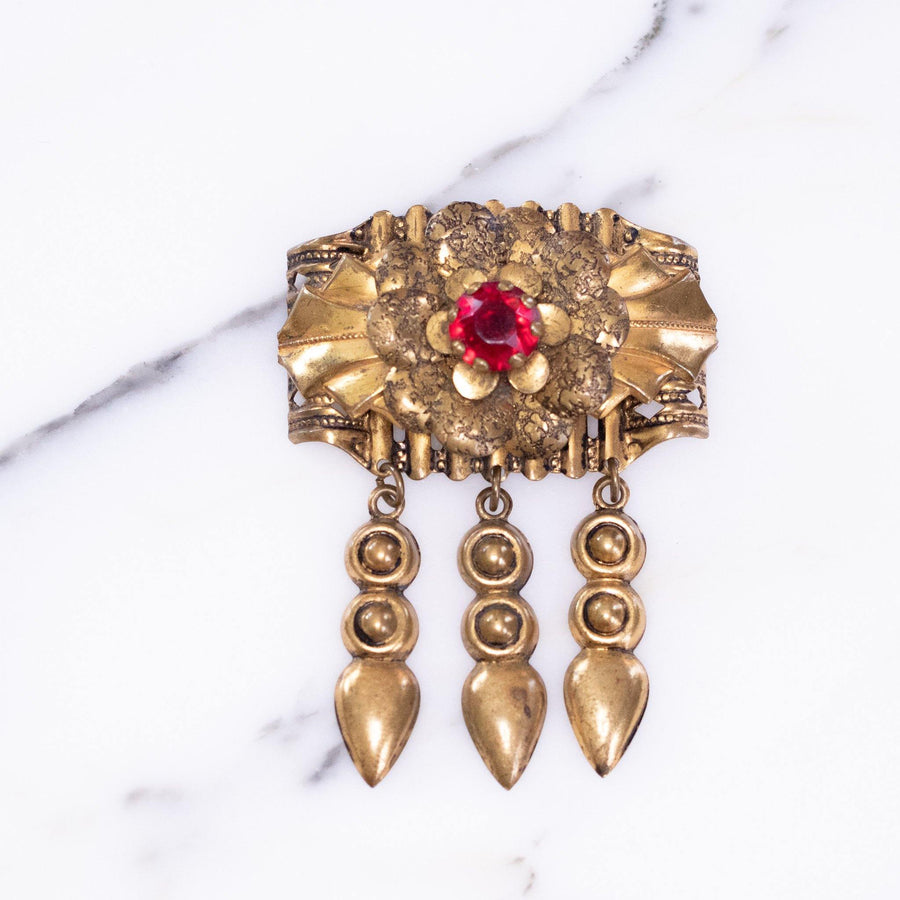 Vintage 1940s Gilt Brooch with Dangles and Red Rhinestone by Vintage Meet Modern - Vintage Meet Modern Vintage Jewelry - Chicago, Illinois - #oldhollywoodglamour #vintagemeetmodern #designervintage #jewelrybox #antiquejewelry #vintagejewelry