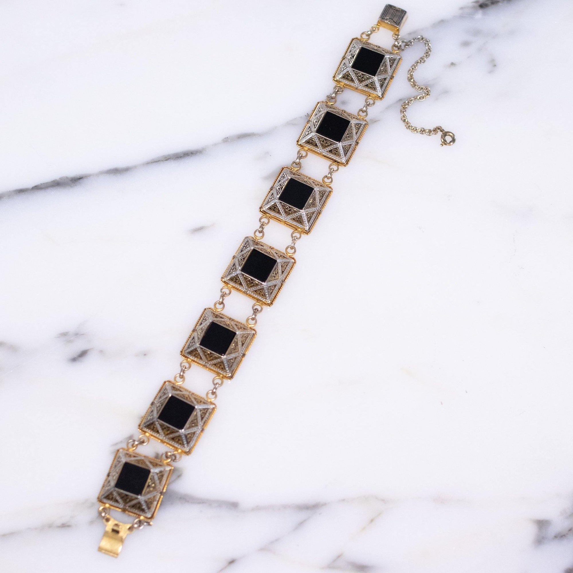 Vintage Black Enamel and Spanish Silver and Gold Damascene Square Link Bracelet by Damascene - Vintage Meet Modern Vintage Jewelry - Chicago, Illinois - #oldhollywoodglamour #vintagemeetmodern #designervintage #jewelrybox #antiquejewelry #vintagejewelry