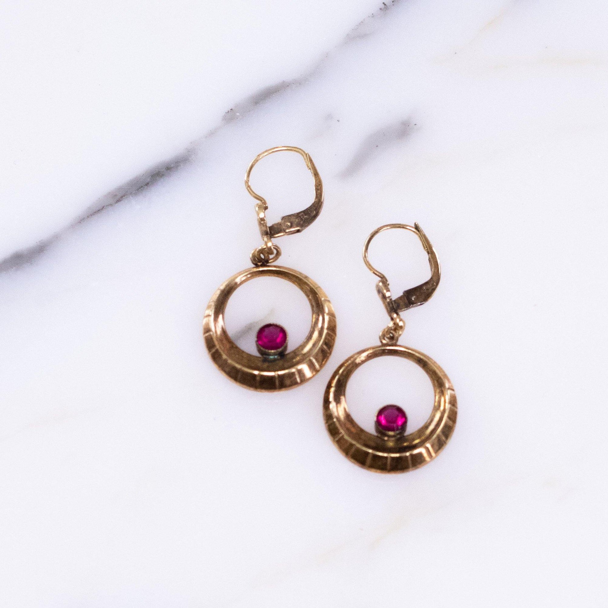 Vintage Rolled Gold Doorknocker Earrings with Ruby Crystal by Vintage Meet Modern - Vintage Meet Modern Vintage Jewelry - Chicago, Illinois - #oldhollywoodglamour #vintagemeetmodern #designervintage #jewelrybox #antiquejewelry #vintagejewelry