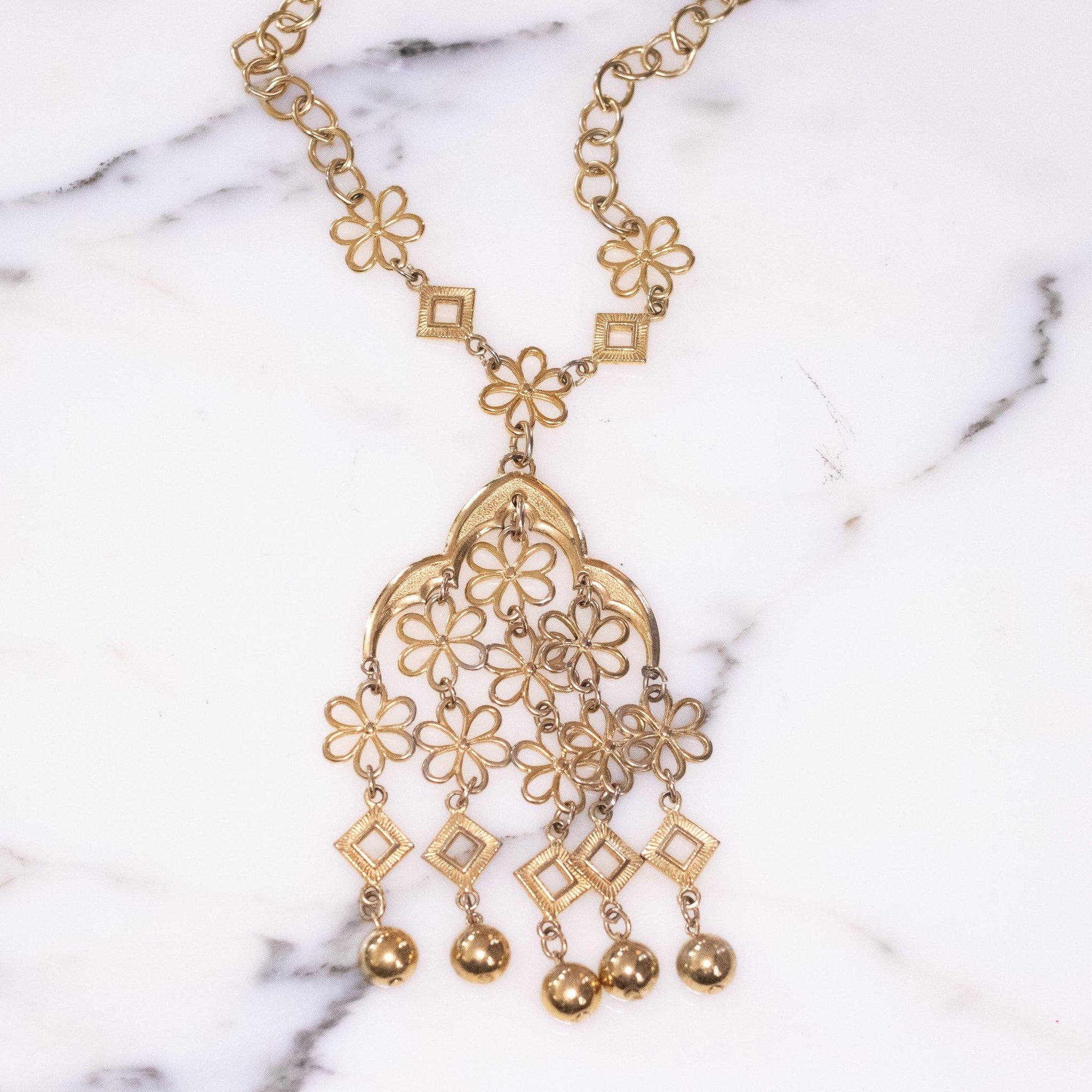 Vintage Crown Trifari Floral Link Tassel Statement Necklace by Vintage Meet Modern - Vintage Meet Modern Vintage Jewelry - Chicago, Illinois - #oldhollywoodglamour #vintagemeetmodern #designervintage #jewelrybox #antiquejewelry #vintagejewelry
