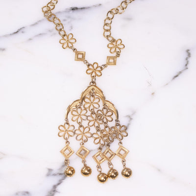 Vintage Crown Trifari Floral Link Tassel Statement Necklace by Vintage Meet Modern - Vintage Meet Modern Vintage Jewelry - Chicago, Illinois - #oldhollywoodglamour #vintagemeetmodern #designervintage #jewelrybox #antiquejewelry #vintagejewelry