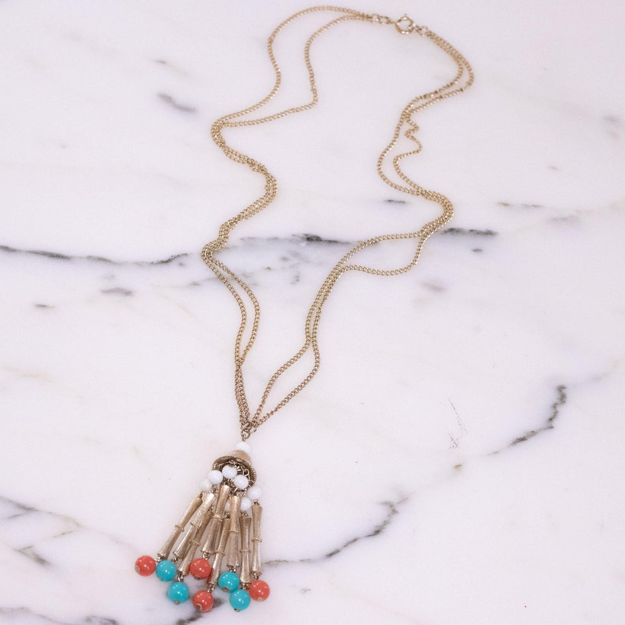 Vintage 1960s Tassel Necklace with White, Coral, and Turquoise Lucite Beads by Vintage Meet Modern - Vintage Meet Modern Vintage Jewelry - Chicago, Illinois - #oldhollywoodglamour #vintagemeetmodern #designervintage #jewelrybox #antiquejewelry #vintagejewelry