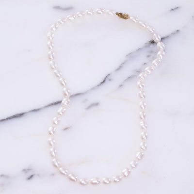 Vintage Freshwater Pearl Necklace by Vintage Meet Modern  - Vintage Meet Modern Vintage Jewelry - Chicago, Illinois - #oldhollywoodglamour #vintagemeetmodern #designervintage #jewelrybox #antiquejewelry #vintagejewelry
