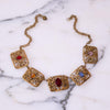 Vintage 1940s Czech Gilt Necklace with Jewel Tone Rhinestones in Red, Blue, Yellow, and Purple by Vintage Meet Modern - Vintage Meet Modern Vintage Jewelry - Chicago, Illinois - #oldhollywoodglamour #vintagemeetmodern #designervintage #jewelrybox #antiquejewelry #vintagejewelry