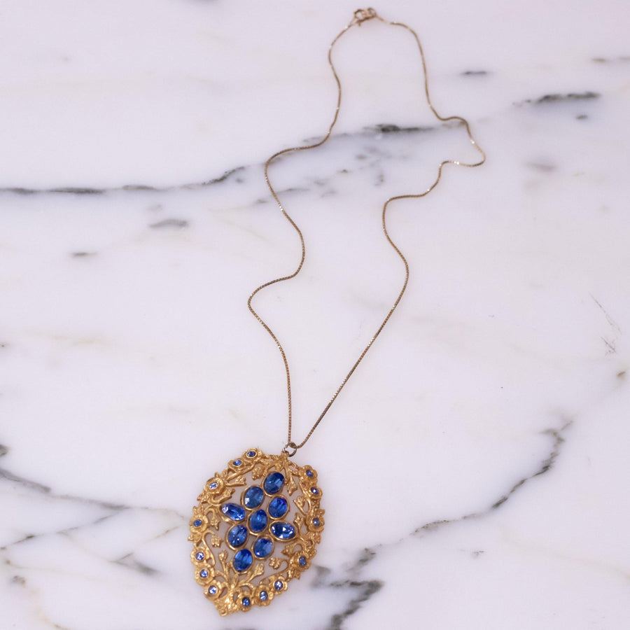 Vintage Czech Gilt Gold Tone Sapphire Blue Crystal Pendant by 1940s - Vintage Meet Modern Vintage Jewelry - Chicago, Illinois - #oldhollywoodglamour #vintagemeetmodern #designervintage #jewelrybox #antiquejewelry #vintagejewelry