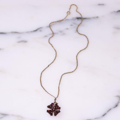 Vintage 1920s 1930s Era Bohemian Garnet Petite Maltese Cross Pendant Necklace by Bohemian Garnet - Vintage Meet Modern Vintage Jewelry - Chicago, Illinois - #oldhollywoodglamour #vintagemeetmodern #designervintage #jewelrybox #antiquejewelry #vintagejewelry