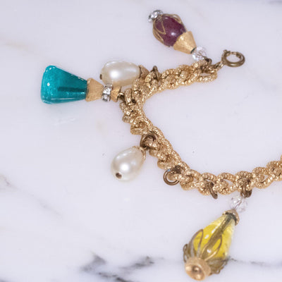 Vintage 1960s Colorful Art Glass Charm Bracelet by Vintage Meet Modern - Vintage Meet Modern Vintage Jewelry - Chicago, Illinois - #oldhollywoodglamour #vintagemeetmodern #designervintage #jewelrybox #antiquejewelry #vintagejewelry