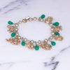 Vintage Faux Pearl with Gold Walking Elephant and Jade Glass Bead Charm Bracelet by Vintage Meet Modern - Vintage Meet Modern Vintage Jewelry - Chicago, Illinois - #oldhollywoodglamour #vintagemeetmodern #designervintage #jewelrybox #antiquejewelry #vintagejewelry