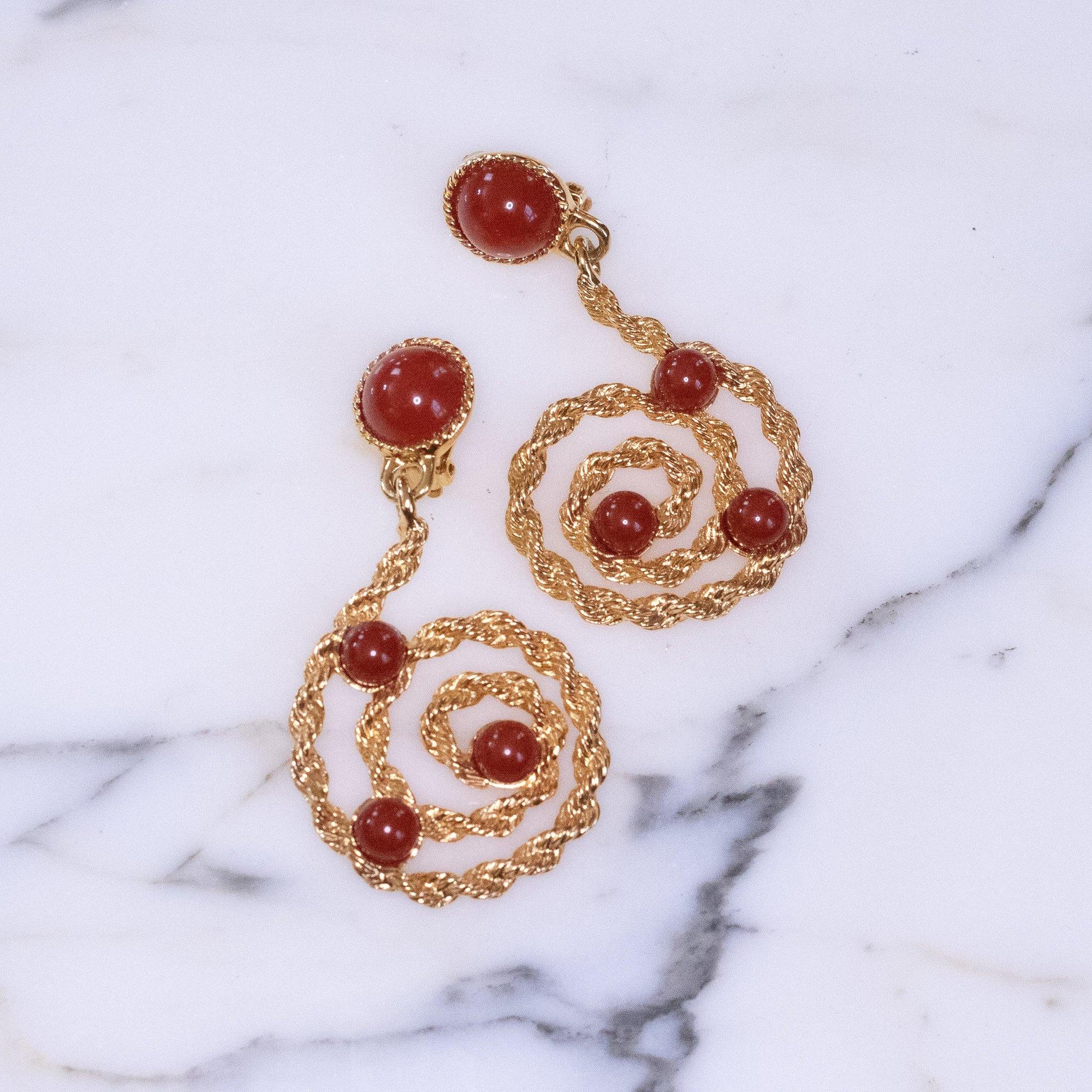 Vintage Avon Gold Scroll Statement Earrings with Carnelian Lucite Cabochons by Avon - Vintage Meet Modern Vintage Jewelry - Chicago, Illinois - #oldhollywoodglamour #vintagemeetmodern #designervintage #jewelrybox #antiquejewelry #vintagejewelry