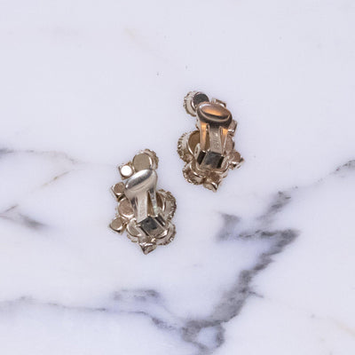 Vintage Weiss Aurora Borealis Cluster and Pressed Glass Flower Earrings by Vintage Meet Modern  - Vintage Meet Modern Vintage Jewelry - Chicago, Illinois - #oldhollywoodglamour #vintagemeetmodern #designervintage #jewelrybox #antiquejewelry #vintagejewelry