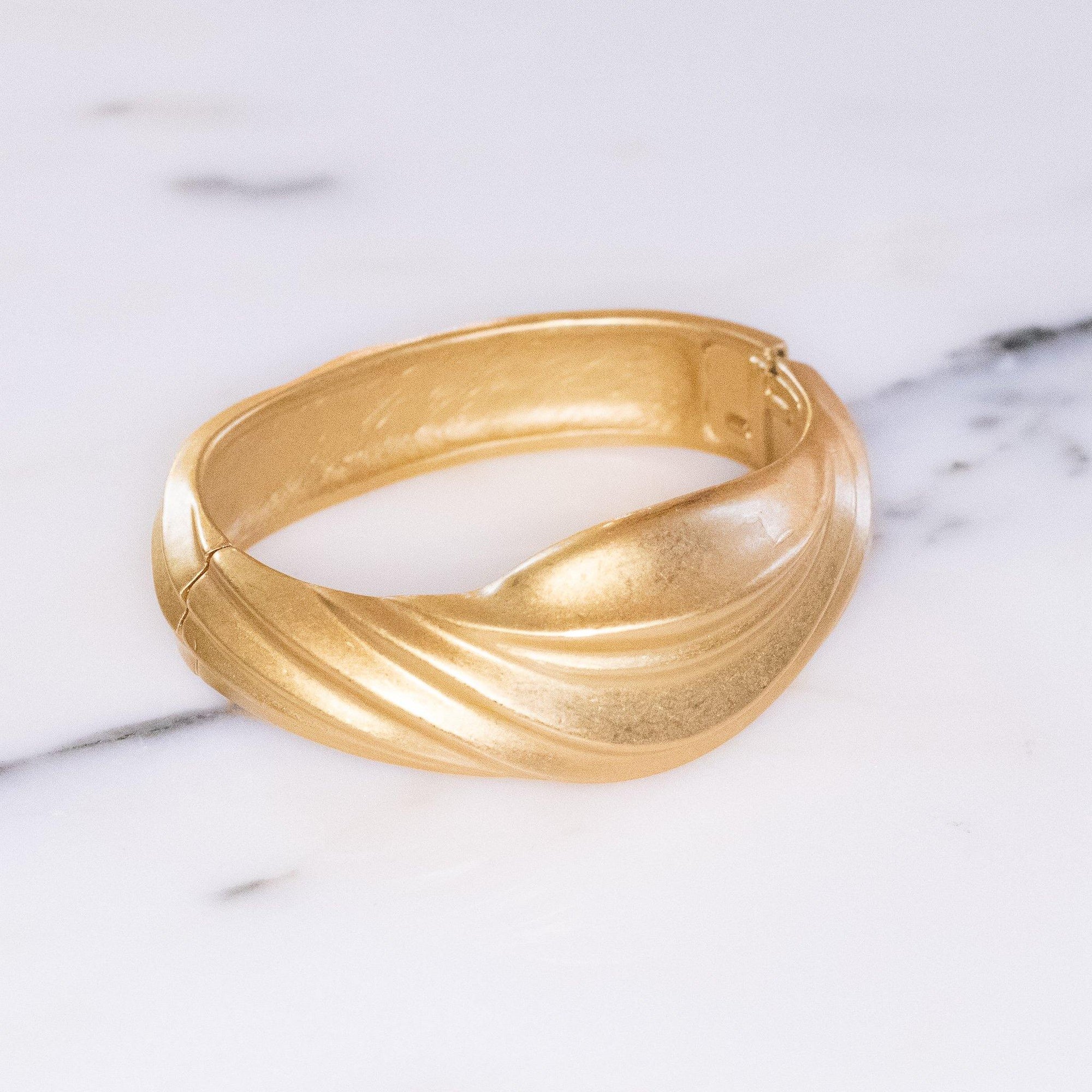 Vintage Crown Trifari Matte Gold Swirl Hinged Bangle Bracelet by Crown Trifari - Vintage Meet Modern Vintage Jewelry - Chicago, Illinois - #oldhollywoodglamour #vintagemeetmodern #designervintage #jewelrybox #antiquejewelry #vintagejewelry
