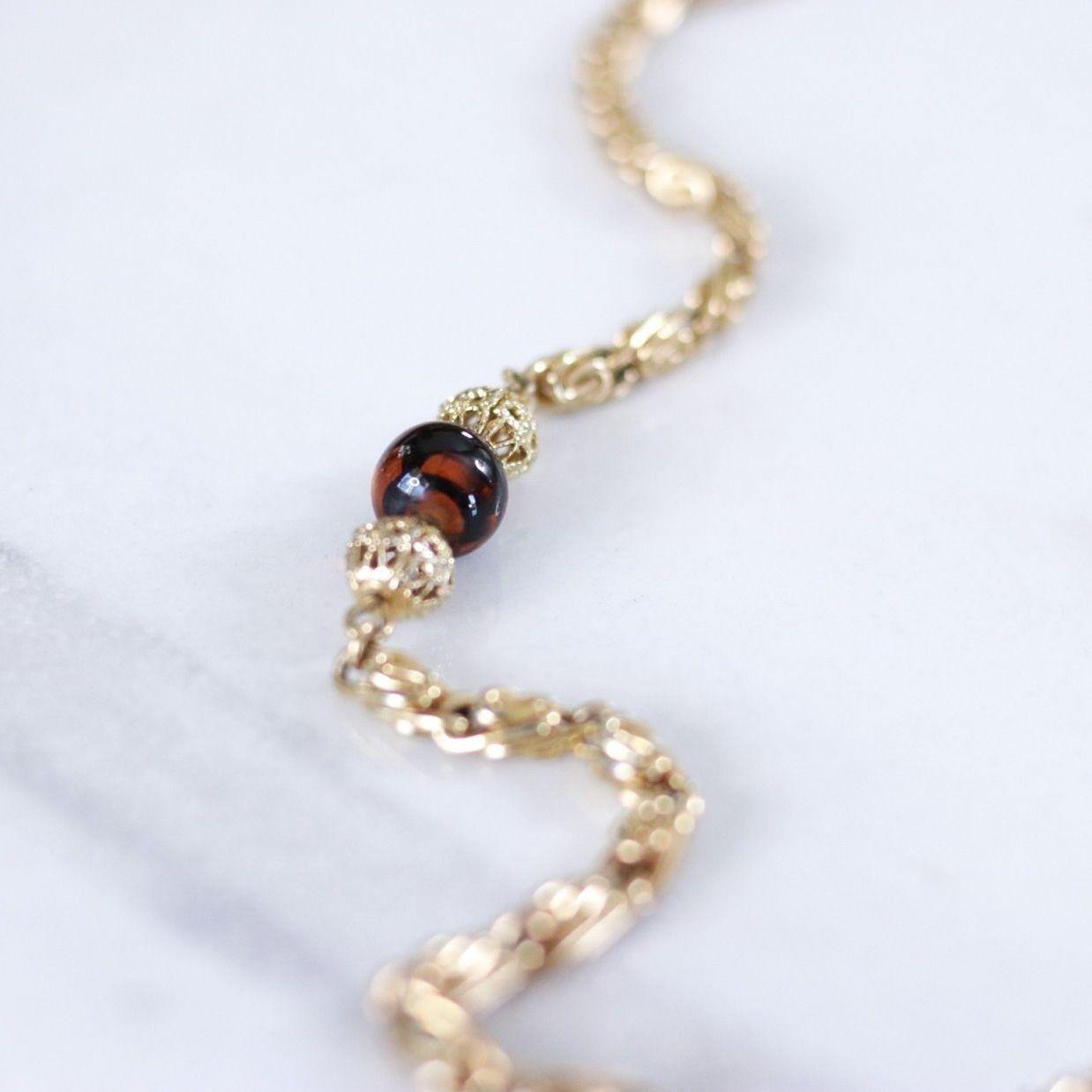 Vintage Tortoise Glass Pendant Necklace by Unsigned Beauty - Vintage Meet Modern Vintage Jewelry - Chicago, Illinois - #oldhollywoodglamour #vintagemeetmodern #designervintage #jewelrybox #antiquejewelry #vintagejewelry